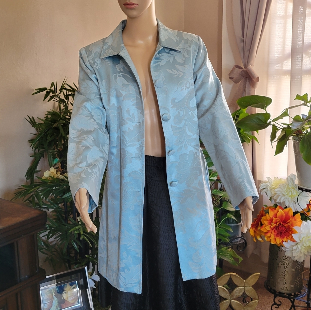 Light blue button up coat. Beautiful for dress or jeans